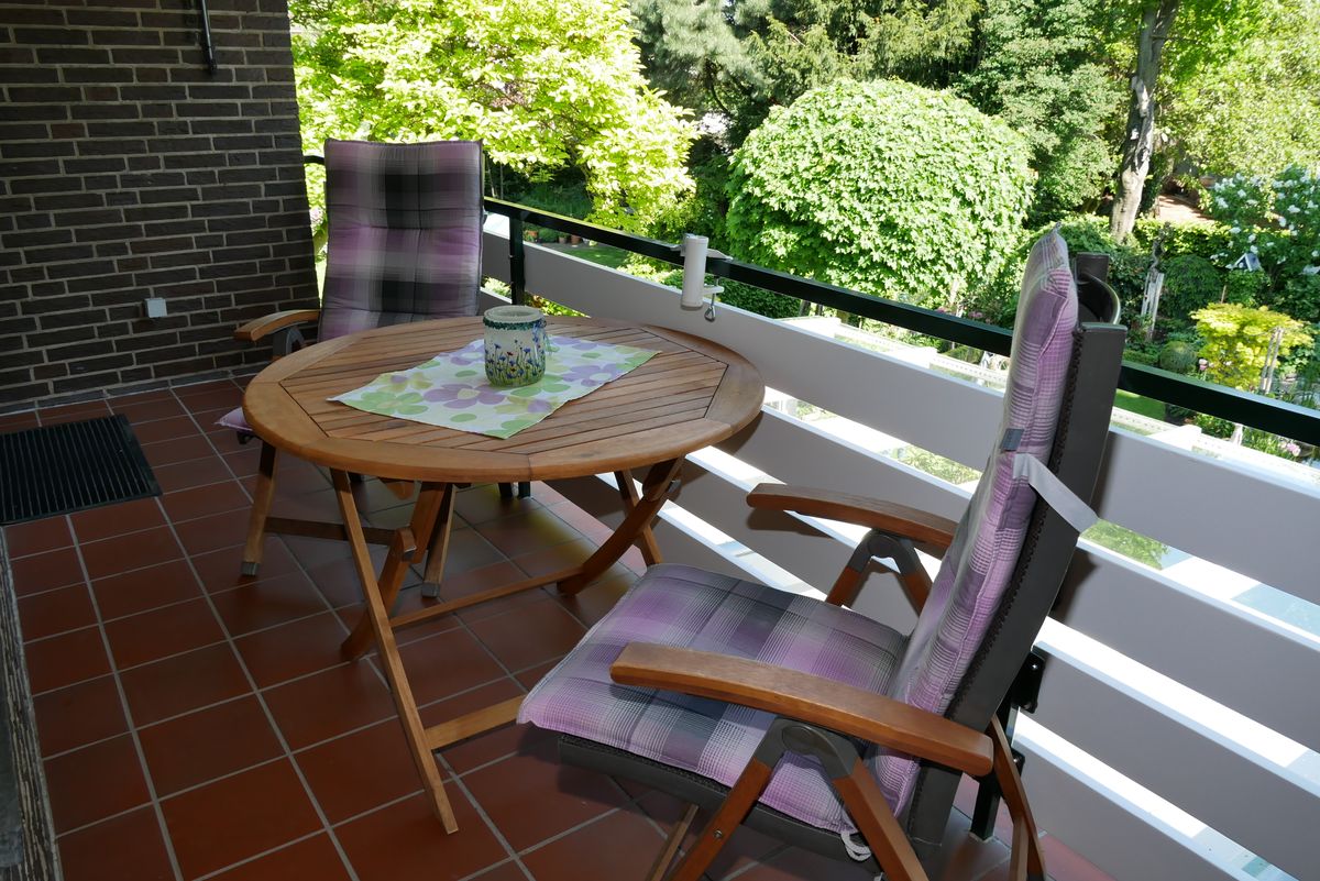 Balcony with garden view and lounge chair